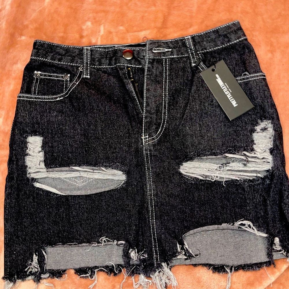 BLACK DISTRESSED MINI SKIRT